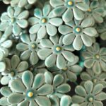 Keramieken bloem Madeliefje mint mini op prikker